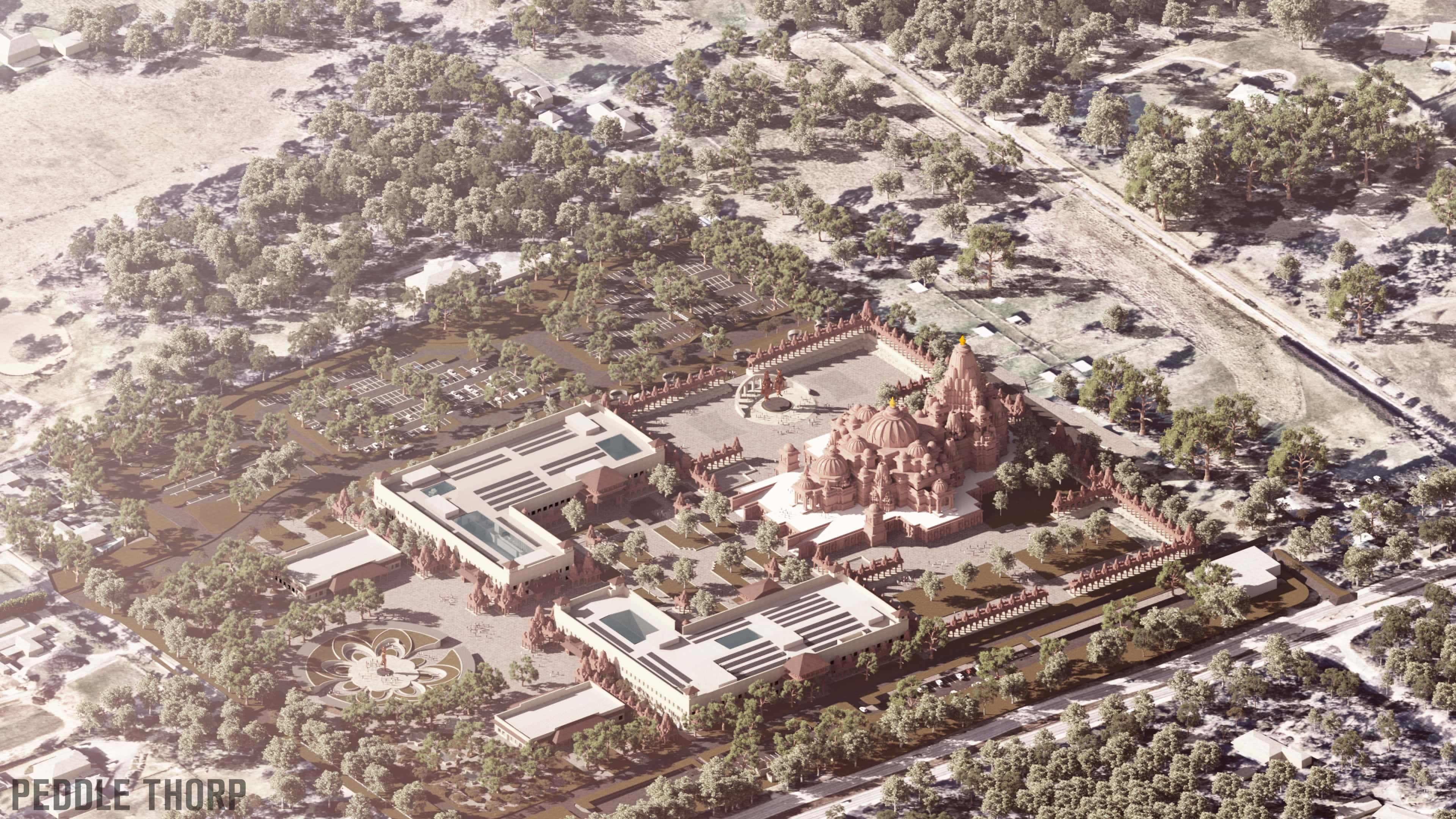 Bird’s-eye view of the site from above at Cranbourne South, with the Mahā-Mandir at its centre, with supporting pavilions, gardens, parking and retained tree cover